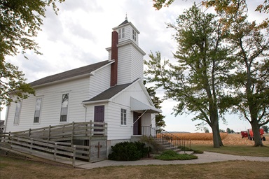 Corn is harvested from a field next to New Hope Bethel United Methodist Church outside Leipsic, Ohio, in 2010. Allen T. Stanton, author of “Reclaiming Rural: Building Thriving Rural Congregations,” suggests the church can be a leader in economic and community development. File photo by Mike DuBose, UM News. Corn is harvested from a field next to New Hope Bethel United Methodist Church outside Leipsic, Ohio, in 2010. Allen T. Stanton, author of “Reclaiming Rural: Building Thriving Rural Congregations,” suggests the church can be a leader in economic and community development. File photo by Mike DuBose, UM News.