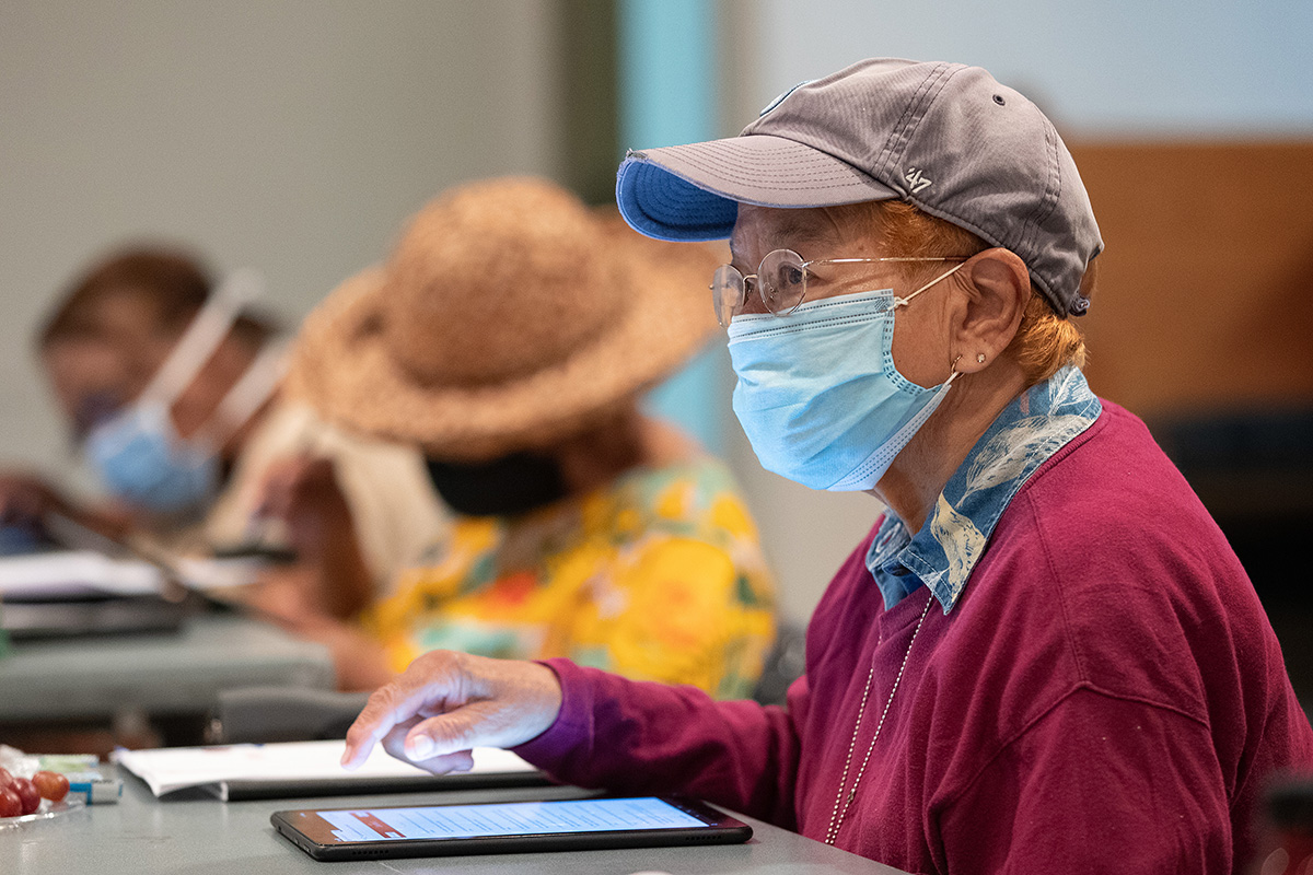 Ethel Battle learns how to use her new tablet computer during a training session for Project Connect at Gordon Memorial United Methodist Church in Nashville, Tenn. The church received a $7,000 grant from Discipleship Ministries to help seniors remain connected to church and community services, many of which moved online during the COVID-19 pandemic. Photo by Mike DuBose, UM News. 