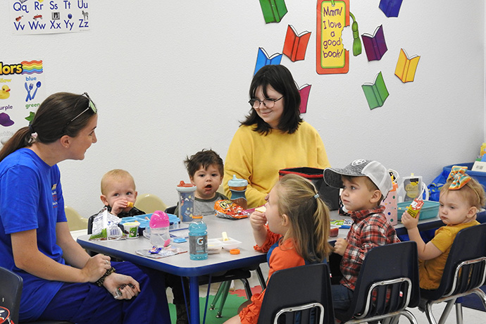 A toddlers’ class at the new Methodist Children’s Center in Linden, Texas, takes a lunch break on Oct. 18, the center’s opening day. The Texas Conference has worked with local United Methodist churches to open five child care centers in underserved areas. The Linden center, done in partnership with Linden United Methodist Church, is the latest. Photo by Sam Hodges, UM News.