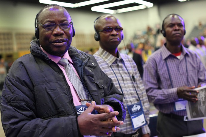 Kwanzia kushoto Vagris Umba, Bertin Kyungu and Adolphe Kitenge, wajumbe wa Nord Katanga, wanasikiricha kwa ibada ya asubuhi katika Mukutano ya 2016 ya Kanisa ya Methodiste mu Portland Convention Center. Photo ya Kathleen Barry, UMNS  Kwanzia kushoto Vagris Umba, Bertin Kyungu and Adolphe Kitenge, wajumbe wa Nord Katanga, wanasikiricha kwa ibada ya asubuhi katika Mukutano ya 2016 ya Kanisa ya Methodiste mu Portland Convention Center. Photo ya Kathleen Barry, UMNS