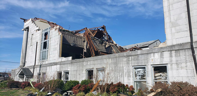 An exterior view of Mayfield First United Methodist Church in Mayfield, Ky., shows the roof torn from the middle section of the building after a devastating line of tornadoes leveled the small town on Dec. 10. Photo courtesy of Mayfield First United Methodist Church via Facebook.