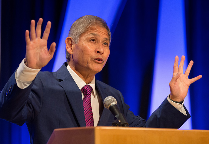 United Methodist Bishop Grant Hagiya addresses the Pre-General Conference Briefing in Portland, Ore., in 2016. Hagiya serves as president of the Claremont School of Theology corporation and is on the school's trustee board.  File photo by Mike DuBose, UM News.