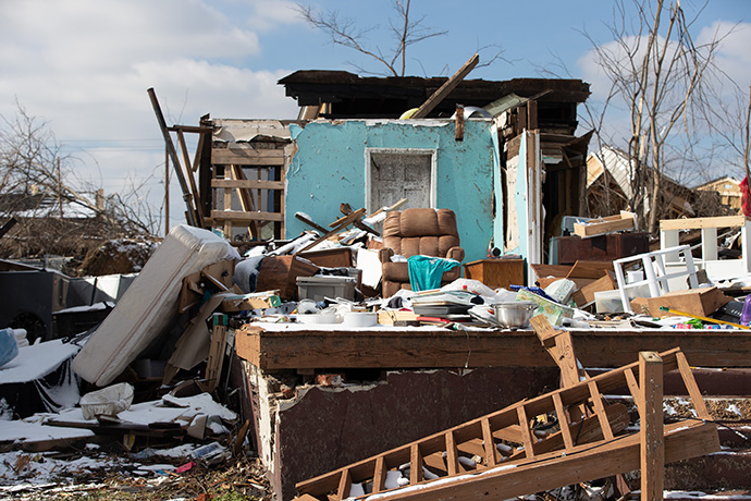 Snow covers storm debris and personal belongings nearly six weeks after a Dec. 10, 2021, tornado devastated much of downtown Mayfield, Ky. Photo by Mike Dubose, UM News.