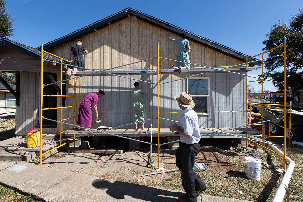 Members of a volunteer team from the Amish community in Ohio work on a home that was damaged by multiple natural disasters in Lake Charles, La. They are part of a coalition of the Louisiana Conference of The United Methodist Church, Fuller Center Disaster ReBuilders, and Mennonite Disaster Services. 