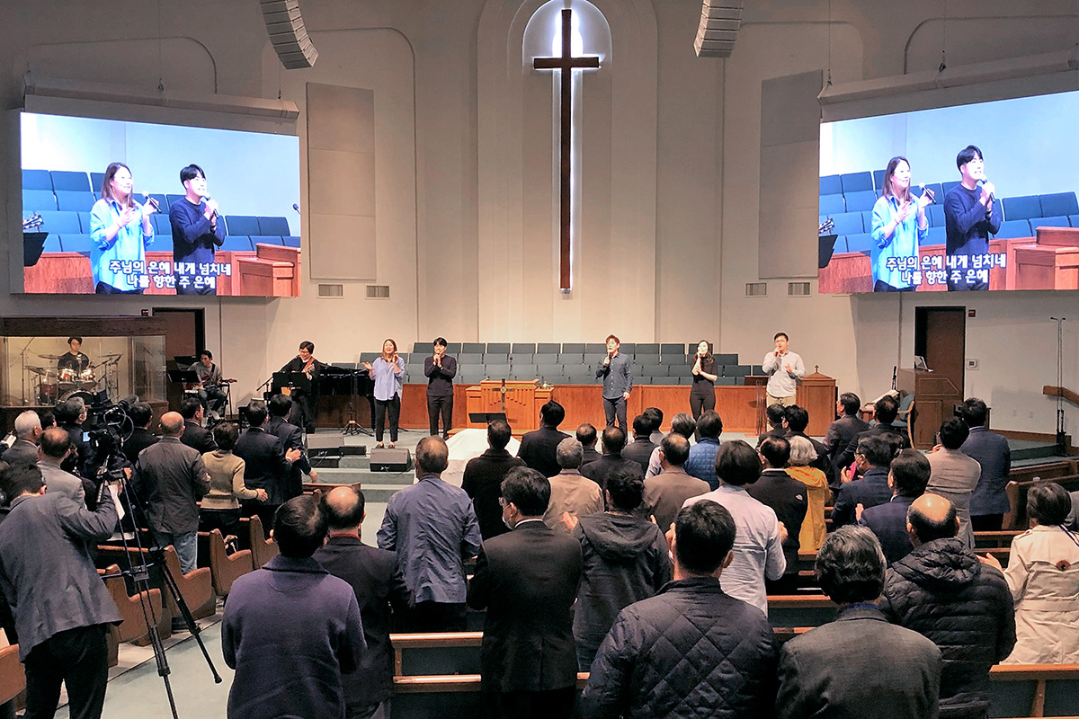 A praise team from Central Korean United Methodist Church in Dallas leads hymns and songs during the first in-person gathering of the Association of Korean Churches in The United Methodist Church. Photo by the Rev. Thomas Kim, UM News.