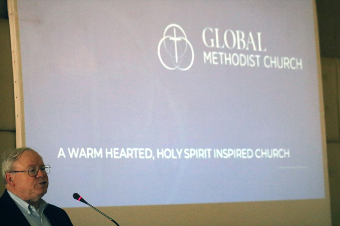 Keith Boyette, transitional connectional coordinating officer for the Global Methodist Church, addresses members of the Africa Initiative during that group’s Prayer and Leadership Summit May 13-18 in Nairobi, Kenya. He explained to delegates the nature and operations of the new denomination and the steps for joining. Photo by E Julu Swen, UM News.