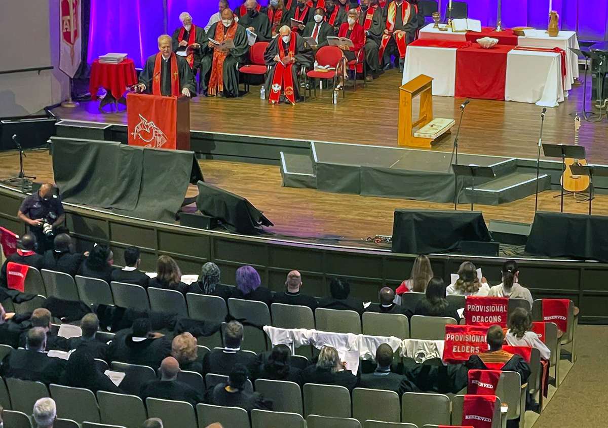 Draped chairs symbolize that Florida Conference candidates for provisional membership — an important step toward ordination as elder or deacon — failed to get approved by the conference clergy session. The controversial decision, made during the conference’s gathering in Lakeland, Fla., illustrated denominational division over LGBTQ inclusion. The decision also altered the June 11 concluding service, where the 16 were to be commissioned. Photo by Esther Rodriguez via Facebook.