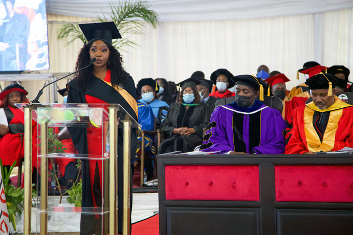 Valedictorian Tanyaradzwa Laura Chemwayi speaks during Africa University's 28th graduation ceremony in Mutare, Zimbabwe, on June 11. Chemwayi graduated with a Bachelor of Science Honors Degree in natural resource management. Photo courtesy of Africa University. 