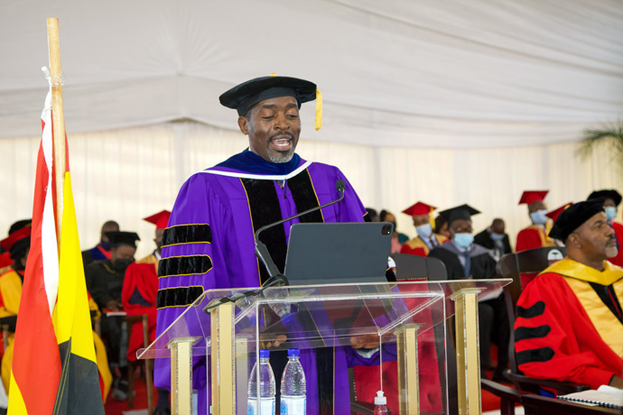 The Rev. Peter Mageto, vice chancellor and professor at Africa University, congratulates graduates on their achievements during the 28th graduation ceremony June 11 in Mutare, Zimbabwe. Mageto highlighted the university’s progress in research, particularly related to malaria, child rights and nursing. Photo courtesy of Africa University. 