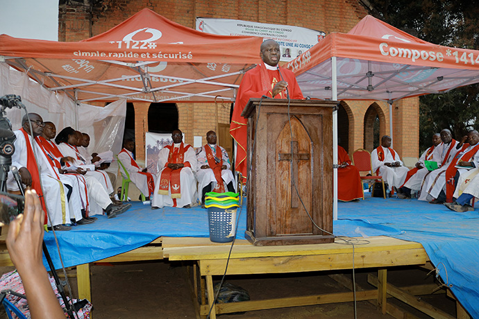 Bishop Guy Mande Muyombo brings greetings from the United Methodist Council of Bishops during the 100th anniversary celebration for the church. Photo by Philippe Kituka Lolonga, UM News.
