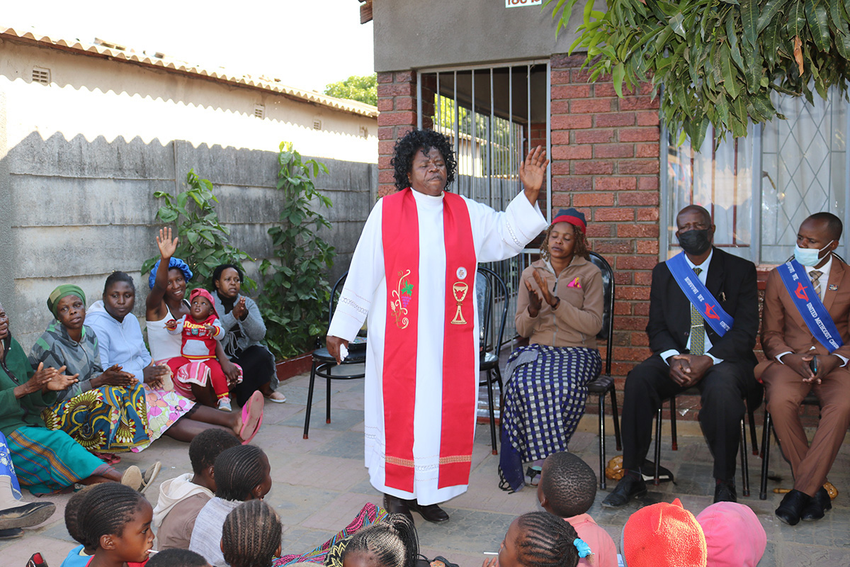 The Rev. Susan Manyange preaches for the First Street Group, an informal church gathering in Chitungwiza, Zimbabwe, a community that is home to commercial sex workers and many struggling with alcoholism and substance abuse. Manyange is pastor of the nearby Seke East United Methodist Church. Photo by Eveline Chikwanah, UM News.