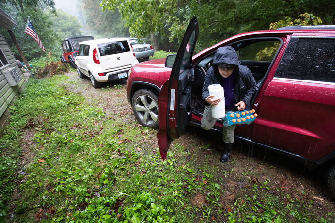 Volunteer Lisa Cox unloads relief supplies from Hindman (Ky.) United Methodist Church for flood survivors in Pippa Passes, Ky. Photo by Mike DuBose, UM News.