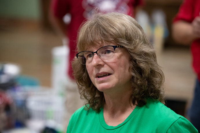 Lorie Street describes flood damage at Hindman Elementary School where she is a teacher. “Every book in our library was destroyed,” she said. “I am an English teacher, so that breaks my heart.” Photo by Mike DuBose, UM News.
