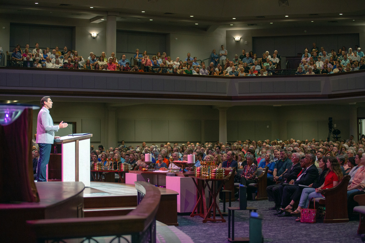 The Rev. Jeff Olive, a Texas Conference district superintendent, presides at an Aug. 7 meeting at The Woodlands Methodist Church called to consider disaffiliation. Members of The Woodlands Methodist, in The Woodlands community north of Houston, voted by a 96.3% margin to leave The United Methodist Church. Photo courtesy of The Woodlands Methodist.