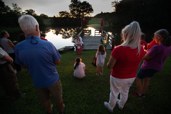 Attendees of the Native Moccasins Rock gathering take part in a service of remembrance for missing and murdered indigenous women at Lake Benson Camp.