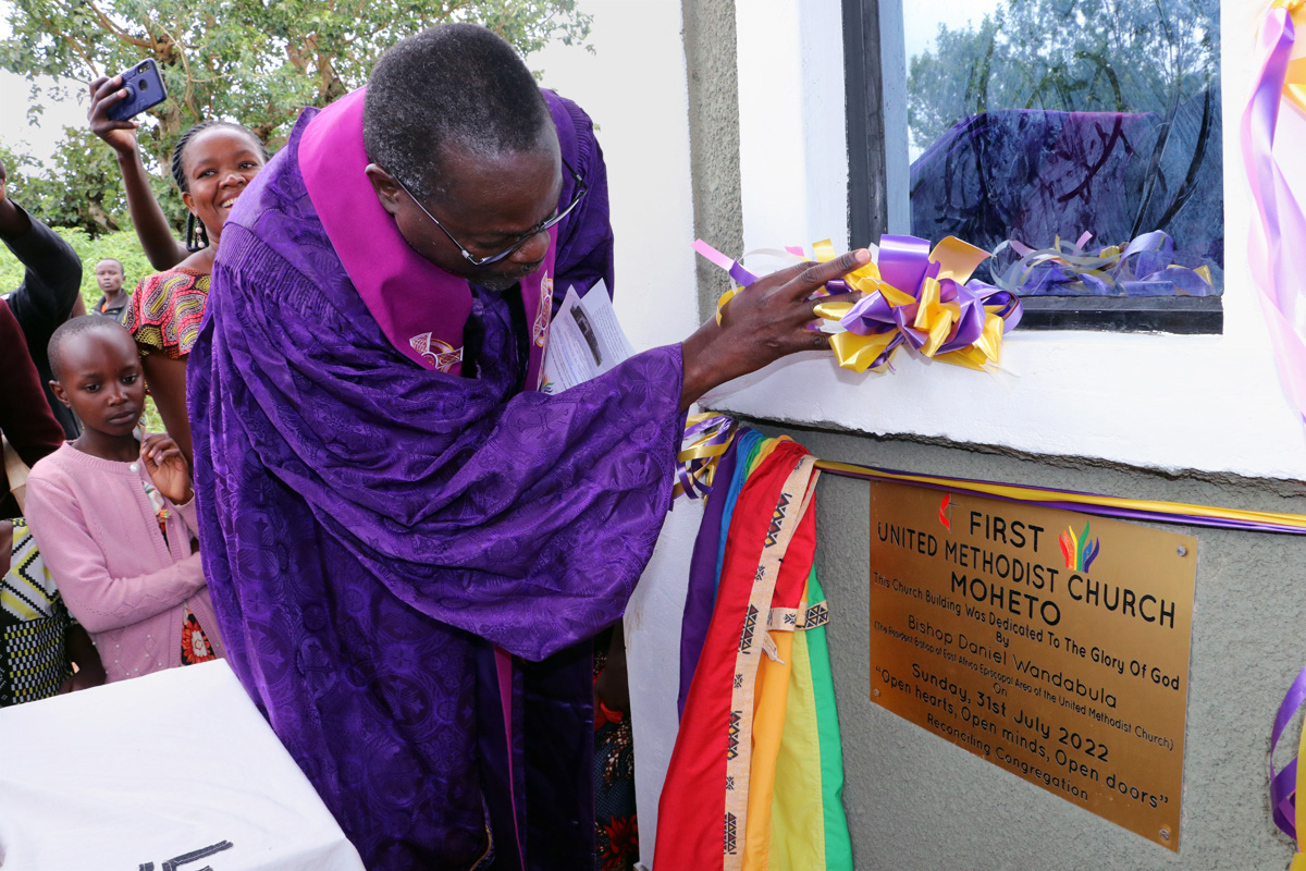 East Africa Area Bishop Daniel Wandabula dedicates the new building of First United Methodist Church Moheto in the Nyanza District of Kenya on July 31. The bishop joined congregants, church leaders and U.S. representatives from Reconciling Ministries Network in celebrating the church’s ministry. In 2019, the church unanimously voted to identify as reconciling — making it the first African congregation to do so. Photo by Gad Maiga, UM News.