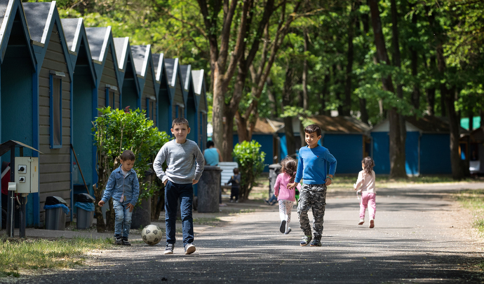 Children who fled the war in Ukraine play at the United Methodist Dorcas church camp, where their families have been given shelter. Photo by Mike DuBose, UM News.