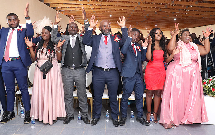 Members of the Mukandi family celebrate during the dedication ceremony for the borehole, parsonage and a sanctuary they donated to Bwanya United Methodist Church. Photo by Kudzai Chingwe, UM News. 