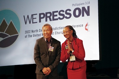 The Rev. Kennetha Bigham-Tsai (right) and her husband, Kee, greet delegates at the North Central Jurisdictional Conference meeting in Fort Wayne, Ind., following her election as bishop. Photo courtesy of NCJ Communications. The Rev. Kennetha Bigham-Tsai (right) and her husband, Kee, greet delegates at the North Central Jurisdictional Conference meeting in Fort Wayne, Ind., following her election as bishop. Photo courtesy of NCJ Communications.