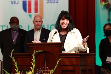 Newly elected Bishop Connie Shelton thanks the delegates of the Southeastern Jurisdictional Conference after her election Nov. 2. Shelton, a district superintendent in the Mississippi Conference, was elected on the 12th ballot with 213 votes. Her husband, the Rev. Joey Shelton, stands behind her. The Southeastern Jurisdictional delegates are meeting Nov. 2-4 in Lake Junaluska, N.C. Photo by Ben Smith, UM News. Newly elected Bishop Connie Shelton thanks the delegates of the Southeastern Jurisdictional Conference after her election Nov. 2. Shelton, a district superintendent in the Mississippi Conference, was elected on the 12th ballot with 213 votes. Her husband, the Rev. Joey Shelton, stands behind her. The Southeastern Jurisdictional delegates are meeting Nov. 2-4 in Lake Junaluska, N.C. Photo by Ben Smith, UM News.