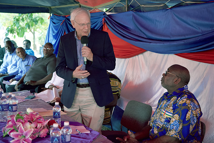 The Rev. John Holler (standing) speaks to Bishop L. Jonathan Holston about the connection and commitment they share with Fairfield Children’s Home. Holler led a campaign that raised $8 million for the South Carolina Epworth Children’s Home. He and Bishop Holston agreed to tithe 10 percent of that money to the United Methodist orphanage in Zimbabwe. Photo courtesy of the Africa University Public Affairs Office.