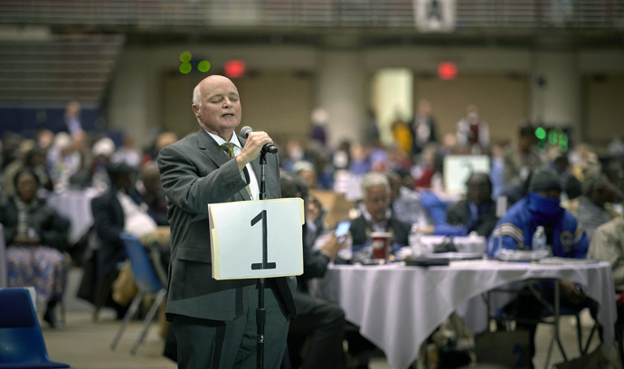 The Rev. W. Timothy McClendon of South Carolina leads delegates in prayer before a vote to strengthen church bans related to homosexuality on the last day of the 2019 special General Conference in St. Louis. McClendon has a filed a complaint and invited others to sign on following the consecration of the denomination’s second openly gay and married bishop. File photo by Paul Jeffrey, UM News.