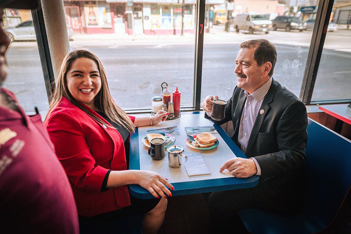 Delia Ramírez Hernández sits with U.S. Rep. Jesus “Chuy” Garcia on the 2022 campaign trail. Garcia endorsed the newly elected representative, calling her a “proven fighter” for diverse working-class families. Photo by Raul Juarez, courtesy of Delia Ramirez, Democrat for Congress.