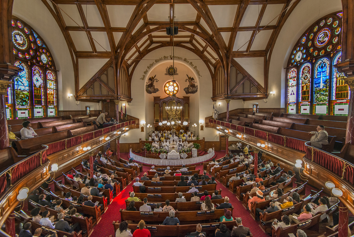 Worshippers attend Mother Bethel African Methodist Episcopal Church in Philadelphia. The AME Church now has a retirement plan with Wespath Benefits and Investments, The United Methodist Church’s pension and benefits agency. The program is allowing the AME Church to get a fresh start after a crisis in its pension system. Photo by R. Kennedy for VISIT PHILADELPHIA®.