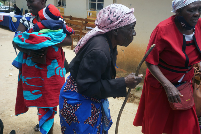 Elderly people walk to access free medical services offered by Runyange United Methodist Church in the Makoni Buhera District of Zimbabwe. The church’s outreach program was aimed at treating the body and soul. Photo by Kudzai Chingwe, UM News.