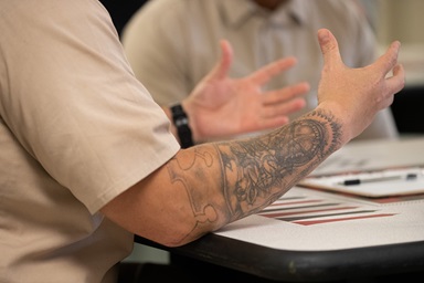 Anthony (foreground), who is incarcerated at the St. Marys Correctional Center in St. Marys, W.Va., says he tries to serve as a role model for new inmates at the facility after seeing the transformation brought about by the Kairos Prison Ministry. Photo by Mike DuBose, UM News. Anthony (foreground), who is incarcerated at the St. Marys Correctional Center in St. Marys, W.Va., says he tries to serve as a role model for new inmates at the facility after seeing the transformation brought about by the Kairos Prison Ministry. Photo by Mike DuBose, UM News.
