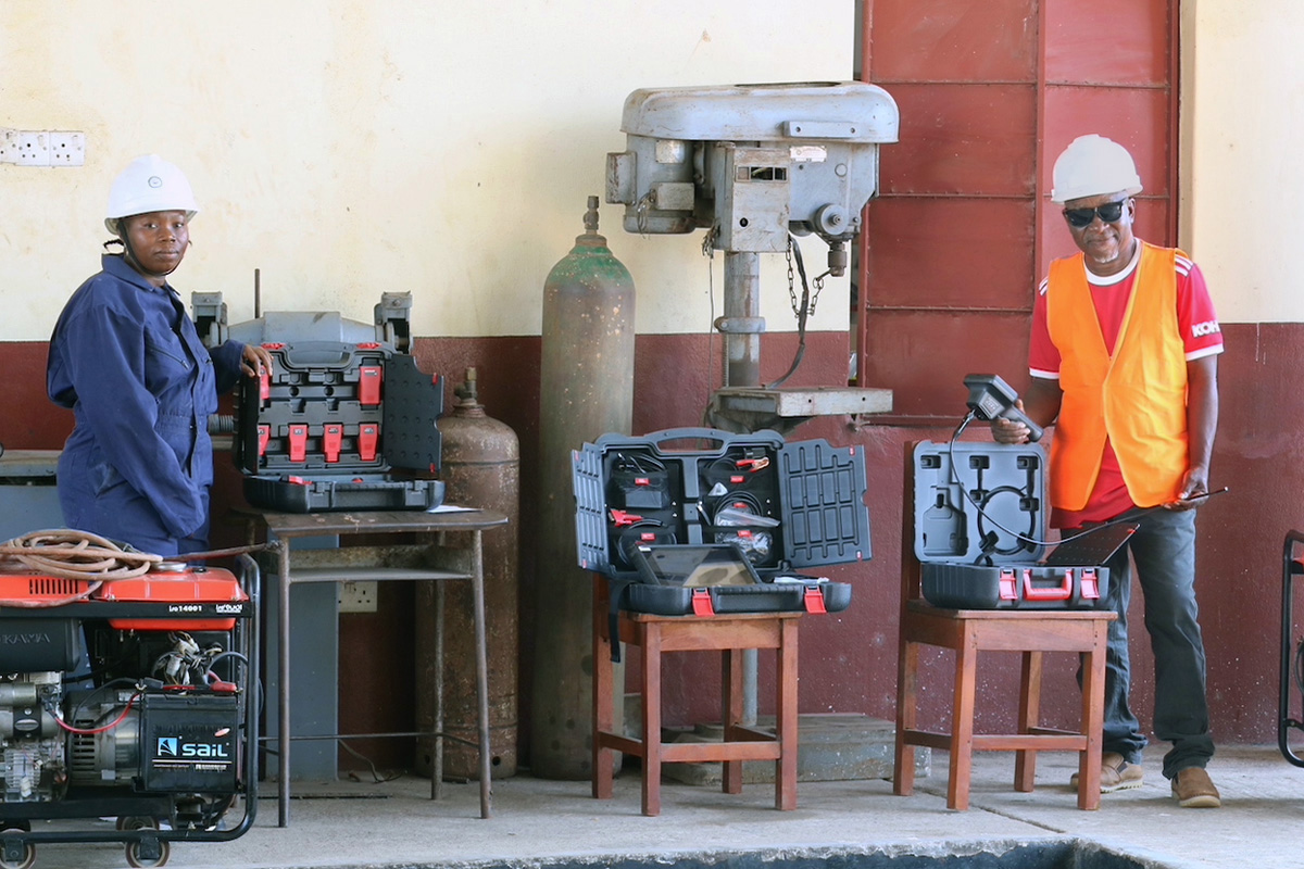 Raymond Kabbah (right), a tutor in Taiama Enterprise Academy’s engineering department, displays a set of state-of-the-art diagnostic tools his department recently received from Operation Classroom, a United Methodist organization supported by U.S. churches in the Indiana Conference The academy is the Sierra Leone Conference’s first hybrid vocational and entrepreneurship school. Kabbah said he believes the equipment is going to be a big boost to his department. Photo by Phileas Jusu, UM News.