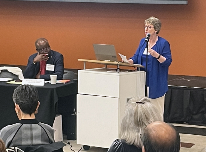 Judi Kenaston (right), interim chief connectional ministries officer of the Connectional Table, speaks Feb. 25 in Atlanta during the leadership body’s meeting. Bishop Mande Muyombo (left), chair of the Connectional Table, is to her right. Photo by Jim Patterson, UM News.