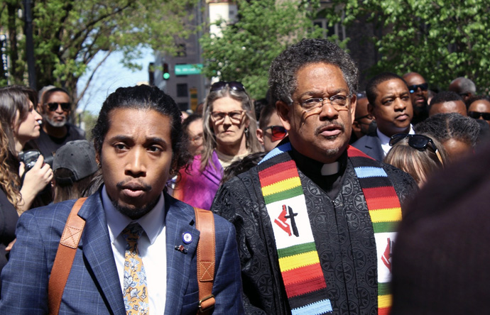 Rep. Justin Jones (left) and the Rev. Stephen Handy of McKendree United Methodist Church walk toward the Tennessee State Capitol in Nashville April 17 during a rally supporting stricter gun laws. Jones, a United Methodist, is one of two lawmakers expelled from the state legislature earlier this month for leading chants for gun reform with a bullhorn on the chamber floor. Photo by Vernon Jordan, UM News.