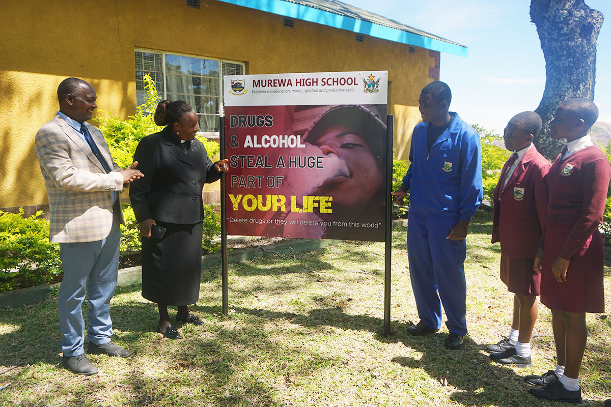 Murewa High School Headmaster Sydney Mapisaunga (left) and the Rev. Nyaradzai Matonga, chaplain at the Zimbabwe school, address students about the dangers of substance abuse. The United Methodist school ramped up efforts to raise awareness about the growing problem after several students were expelled for using drugs. Photo by Kudzai Chingwe, UM News.