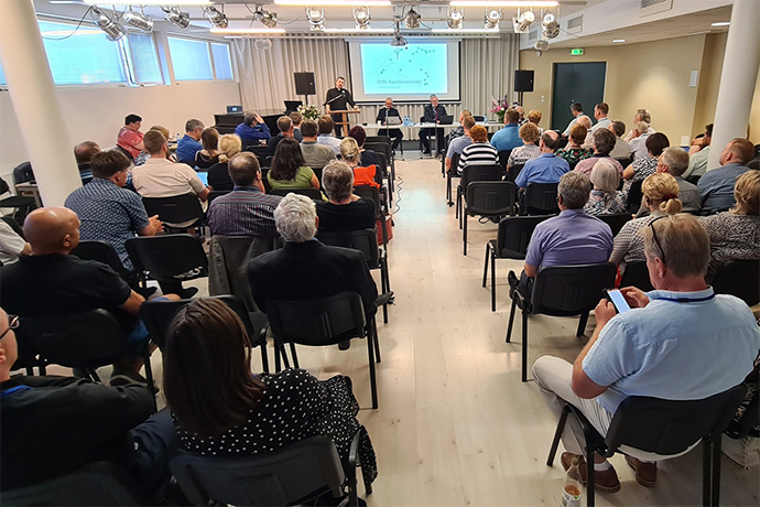 Delegates to the Estonia District, meeting June 16 in Tallinn, Estonia, prepare to take the vote confirming the departure of 23 churches in the Baltic nation. The Estonian churches are forming the autonomous Estonia Methodist Church. The transition will be official on July 1. Photo courtesy of Bishop Christian Alsted. 