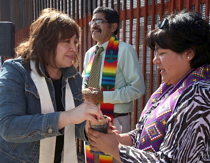 Bishop Minerva Carcaño participates in the communion service held in El Faro Park in Tijuana on May 7, 2013. In the middle is future Bishop Felipe Ruiz Aguilar and to the right is Maria Calixlo-Luna, both leaders in the Methodist Church of Mexico. File photo by Kathleen Barry, UM News.  