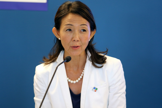 Christine Ahn, executive director of Women Cross DMZ, thanks the speakers and participants at a conference held at George Washington University in Washington, D.C., on July 28. Part of the National Mobilization to End the Korean War event, the conference featured renowned Korea scholars and peace strategists. Photo by the Rev. Thomas E. Kim, UM News.