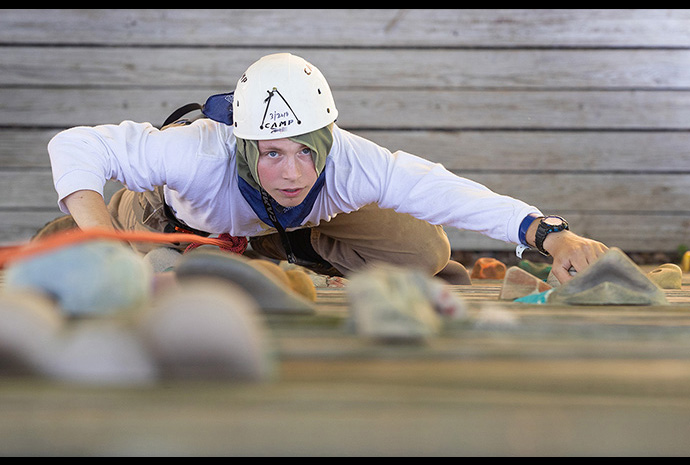 Colin Harward scales the climbing wall during a class at the Boxwell Scout Reservation in Lebanon, Tenn. Harward is a member of Boy Scout Troop 398, which is charted by St. Mark’s United Methodist Church in Murfreesboro, Tenn. Photo by Mike DuBose, UM News.
