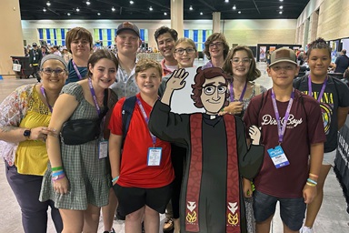 Eighth-grader Ainsley M. (fifth from right) poses with John Wesley and members of  Wildwood United Methodist Church in the Texas Conference at Discipleship Ministries’ Youth 2023 event in Daytona Beach, Fla. in July. Young people from around the United Methodist connection shared their experiences from the gathering with UM News. Photo courtesy of Jessica McMullen, Minister of Families and Communications for Wildwood United Methodist Church. Eighth-grader Ainsley M. (fifth from right) poses with John Wesley and members of  Wildwood United Methodist Church in the Texas Conference at Discipleship Ministries’ Youth 2023 event in Daytona Beach, Fla. in July. Young people from around the United Methodist connection shared their experiences from the gathering with UM News. Photo courtesy of Jessica McMullen, Minister of Families and Communications for Wildwood United Methodist Church.