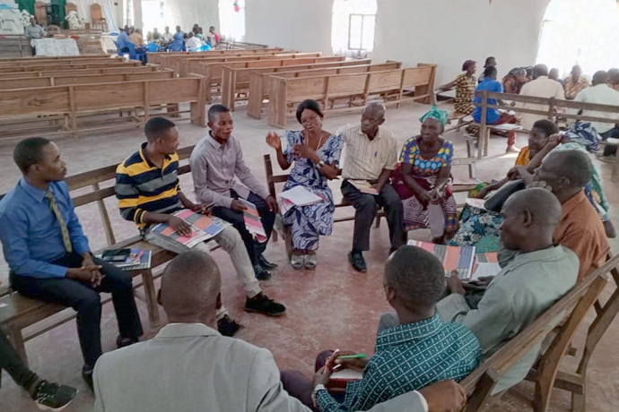 Mutombo wa Maloba Elizabeth (center in blue dress), vice president of the Tanganyika Conference United Women, conducts a focus group workshop during a July 2023 training for civic education leaders. With the country's elections approaching, The United Methodist Church is working to strengthen peace and cohabitation in the Democratic Republic of the Congo by training citizens in civic rights and duties. Photo by Betty Kazadi Musau, UM News.