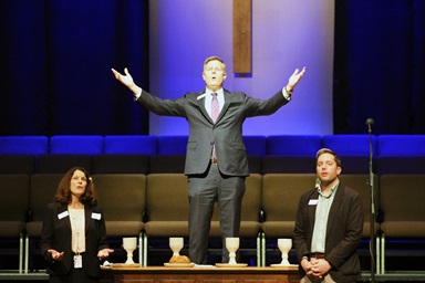 The Rev. Bryan Brooks (center), senior pastor of Franklin First United Methodist Church, prepares for Holy Communion at the close of “Building Community with Older Adults,” a workshop hosted by ENCORE Ministry Oct. 26 at the church in Franklin, Tenn. The event was hosted in partnership with the University of Tennessee Chattanooga’s School of Nursing. Photo by Vernon Jordan, UM News. The Rev. Bryan Brooks (center), senior pastor of Franklin First United Methodist Church, prepares for Holy Communion at the close of “Building Community with Older Adults,” a workshop hosted by ENCORE Ministry Oct. 26 at the church in Franklin, Tenn. The event was hosted in partnership with the University of Tennessee Chattanooga’s School of Nursing. Photo by Vernon Jordan, UM News.