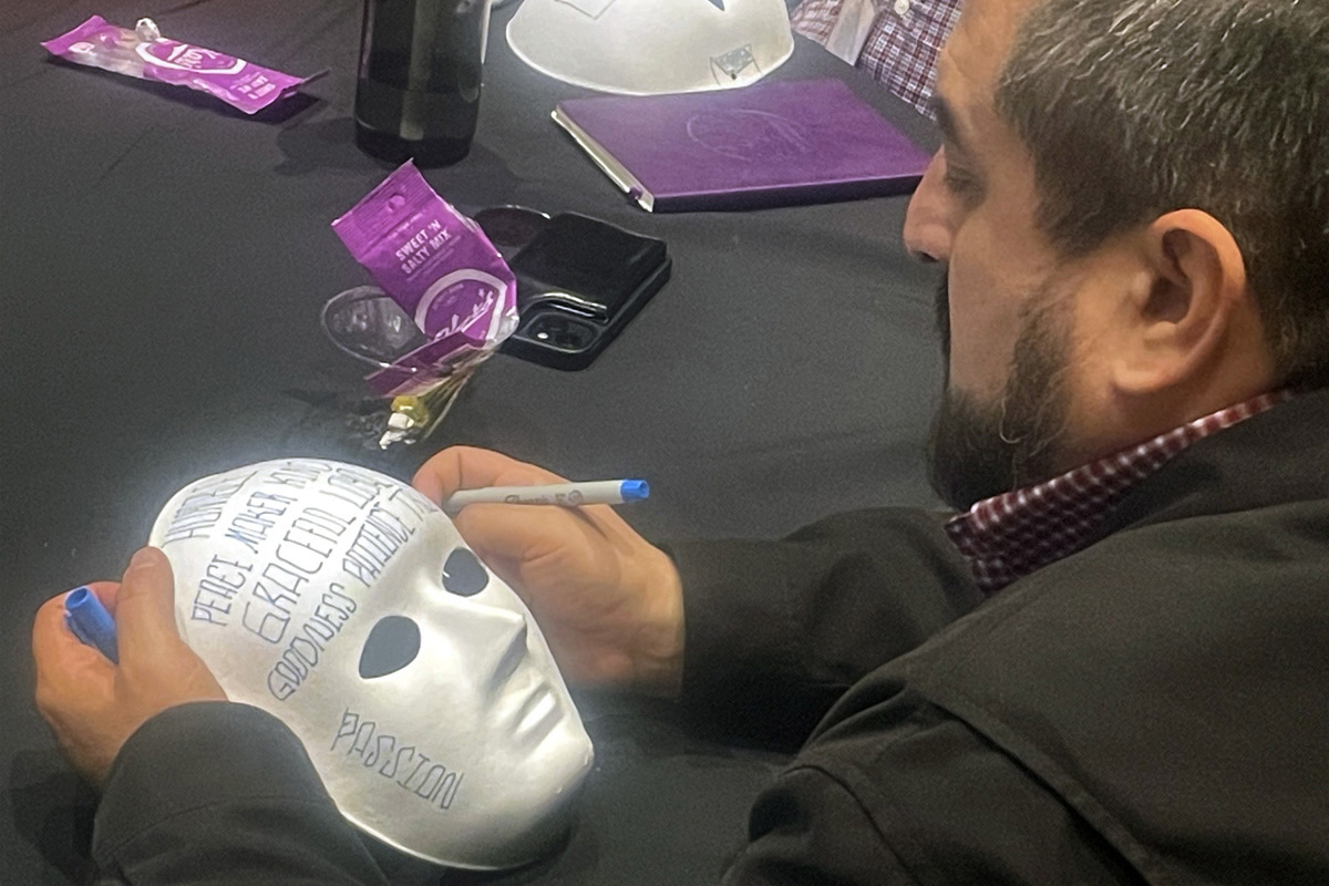 Attendees of the Nov. 14-16 Facing the Future conference in Atlanta pose with blank masks before decorating them as part of an exercise. The conference drew about 300 pastors serving in cross-cultural ministry to share their experiences and learn new ways to be effective. Photo courtesy of the United Methodist Commission on Religion and Race.
