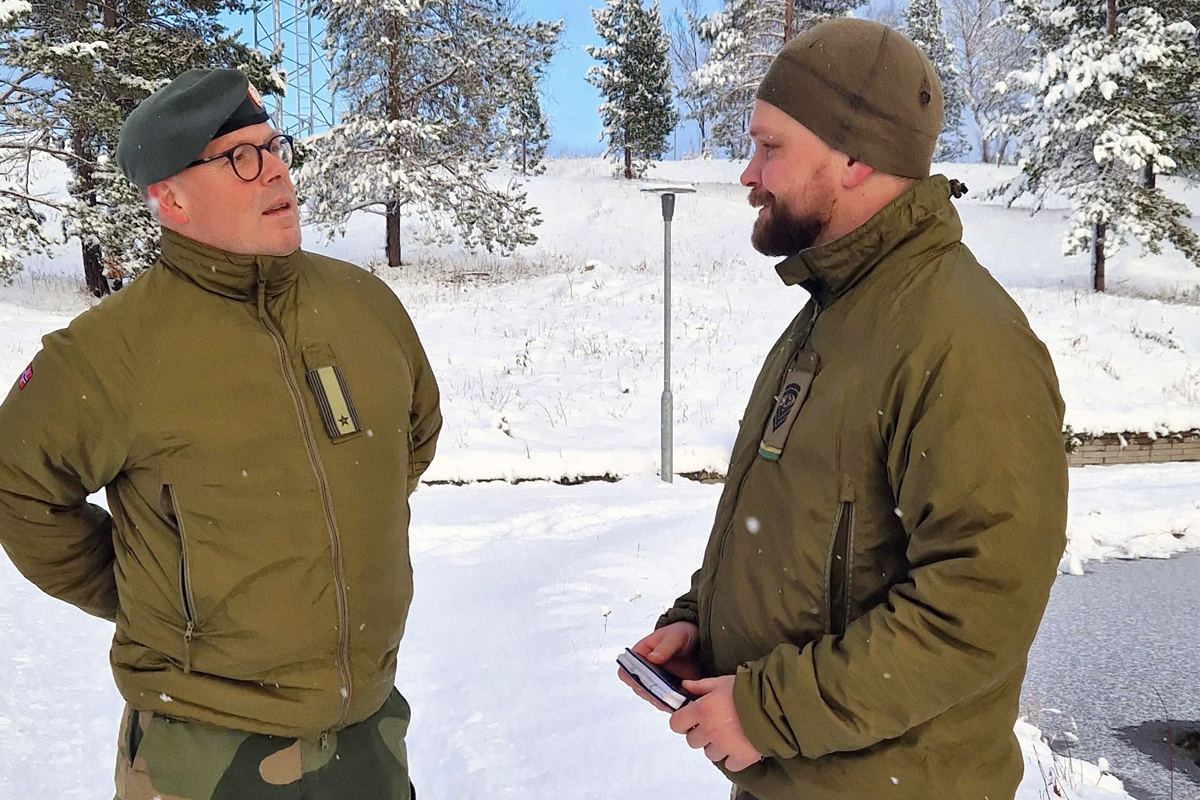 The Rev. Jon Erik Bråthen (left) enjoys chatting with everyone he meets. Based at Porsangmoen near Lakselv in Finnmark, Norway, Bråthen is a military chaplain whose “congregants” include Sámi-speaking peoples who practice semi-nomadic reindeer herding. Photo courtesy of Emil Skartveit.