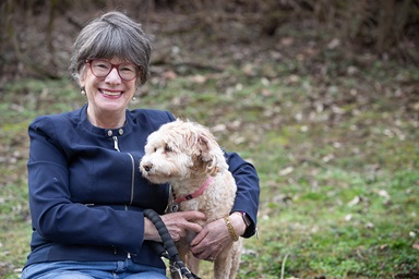New Testament scholar Amy-Jill Levine enjoys quality time with Morey, her labradoodle. Levine is the author of a popular series of books about the New Testament, published by Abingdon Press, an imprint of The United Methodist Publishing House. Photo by Mike DuBose, UM News. New Testament scholar Amy-Jill Levine enjoys quality time with Morey, her labradoodle. Levine is the author of a popular series of books about the New Testament, published by Abingdon Press, an imprint of The United Methodist Publishing House. Photo by Mike DuBose, UM News.