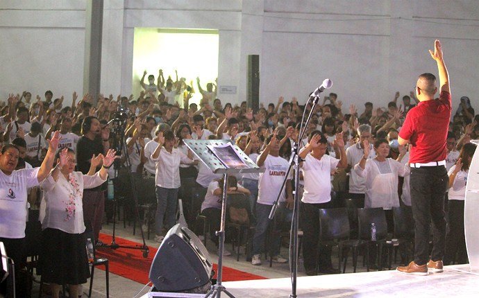 United Methodist Bishop Ruby-Nell Estrella of the Manila Area stands before an audience at Seed of Faith United Methodist Church in Santa Maria, Philippines, during the launch of a new discipleship program for her episcopal area. Bishop Estrella reminded participants that discipleship is transformation and multiplication. Photo by Gladys P. Mangiduyos, UM News. 