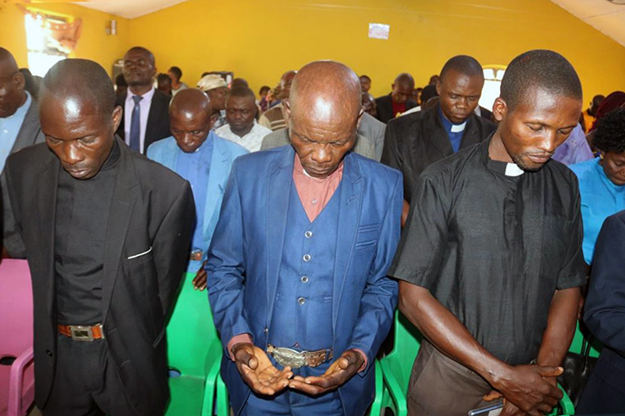 In this file photo, lay leaders and clergy at the Kivu Annual Conference in Goma, Congo, participate in a memorial service for those who died following violence in Eastern Congo in 2023. Local authorities say rebels from the Allied Democratic Forces killed at least 13 civilians, including the president of Komanda United Methodist Church’s women’s organization, in a Feb. 17-18 attack in the Ituri province. July 2023 photo by Philippe Kituka Lolonga, UM News.