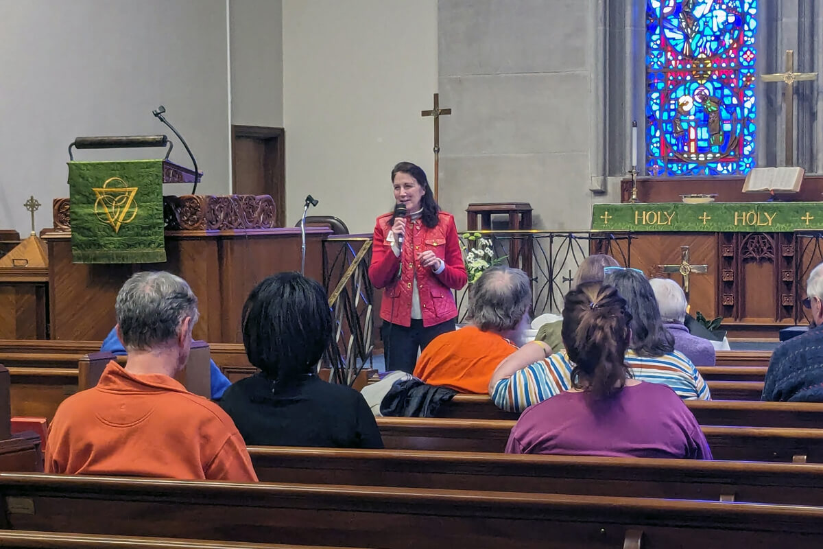 The Rev. Becky Shirley speaks Jan. 18, 2024, at Washington Street United Methodist Church in Columbia, S.C., during the church’s first The WELL service, a monthly worship experience designed for people with Alzheimer’s disease and other conditions that affect memory. The WELL stands for Worship, Encouragement, Laughter and Love. Photo courtesy of Washington Street UMC.