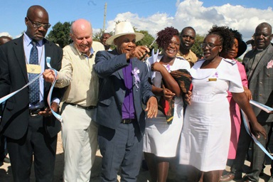United Methodist Bishop Eben K. Nhiwatiwa (center) cuts the ribbon at the dedication of the new Munyarari Mission Clinic in Munyarari, Zimbabwe, on Feb. 24. The state-of-the-art facility was constructed with funds raised by Bel Air United Methodist Church in Bel Air, Md., and its mission team, Chabadza-Healing Hands Across Zimbabwe, in partnership with the local community. To the bishop’s right is David Talbot, a team leader from Bel Air United Methodist Church. Photo by Kudzai Chingwe, UM News. United Methodist Bishop Eben K. Nhiwatiwa (center) cuts the ribbon at the dedication of the new Munyarari Mission Clinic in Munyarari, Zimbabwe, on Feb. 24. The state-of-the-art facility was constructed with funds raised by Bel Air United Methodist Church in Bel Air, Md., and its mission team, Chabadza-Healing Hands Across Zimbabwe, in partnership with the local community. To the bishop’s right is David Talbot, a team leader from Bel Air United Methodist Church. Photo by Kudzai Chingwe, UM News.