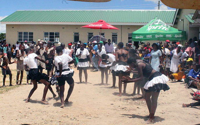 Students from Chinyamuhwera High School perform a traditional dance during the dedication ceremony for the new Munyarari Mission Clinic in Munyarari, Zimbabwe. The clinic boasts three patient wings, a spacious waiting area and a fenced and gated campus. Photo by Kudzai Chingwe, UM News.