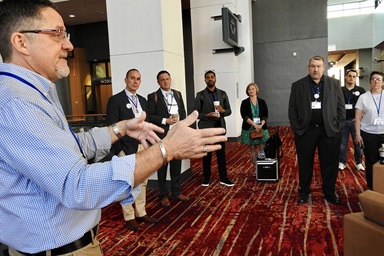 The Rev. Mark Holland (left) briefs on regionalization legislation during an April 25 morning meeting of Mainstream UMC at the Charlotte Convention Center. Mainstream UMC is among various groups seeking to influence legislation and advocate on behalf of causes during the United Methodist General Conference in Charlotte, N.C. Photo by Sam Hodges, UM News.  The Rev. Mark Holland (left) briefs on regionalization legislation during an April 25 morning meeting of Mainstream UMC at the Charlotte Convention Center. Mainstream UMC is among various groups seeking to influence legislation and advocate on behalf of causes during the United Methodist General Conference in Charlotte, N.C. Photo by Sam Hodges, UM News.